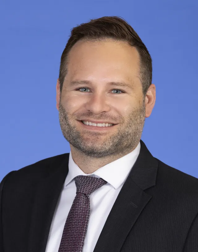 a man in a suit and tie