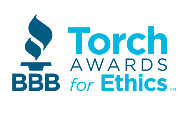 Better Business Bureau Torch Awards logo for Marketplace Ethics with blue torch and text