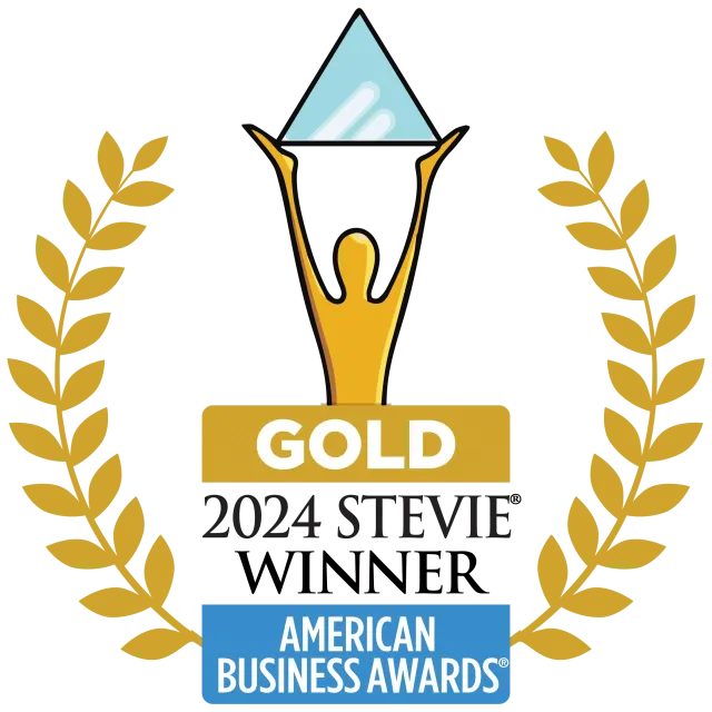 Gold 2024 Stevie Award winner emblem with laurel wreath and blue triangle held by a golden figure.