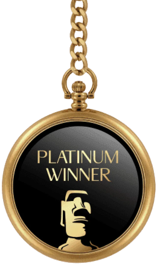 Gold medal with chain labeled Platinum Winner featuring a stylized golden Moai statue on black background.