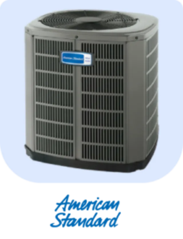 American Standard HVAC outdoor unit with protective grille and top fan on light background.