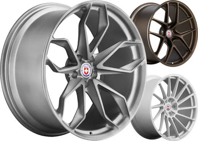 Set of three stylish car alloy wheels in silver, bronze, and white finishes with multi-spoke designs.