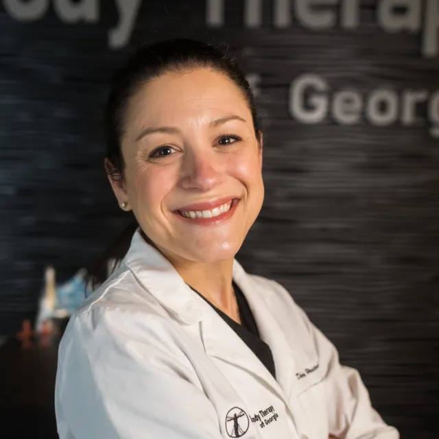 a person smiling for the camera