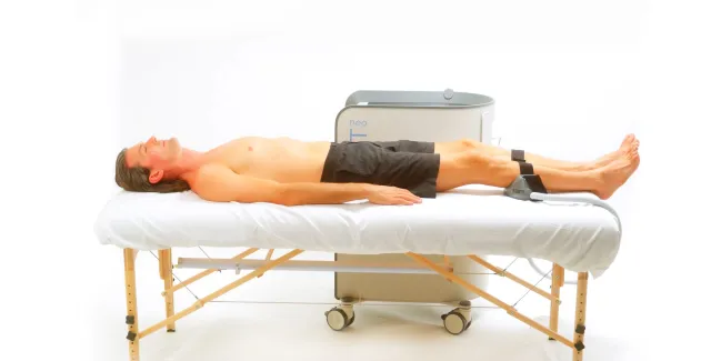 a person laying on a bed