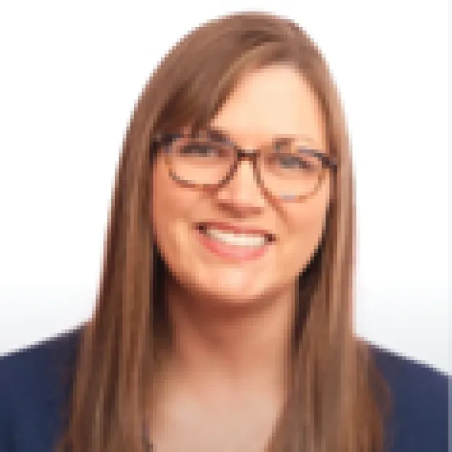 a woman wearing glasses