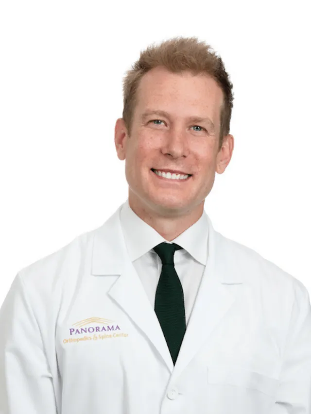 a man wearing a white shirt and a tie