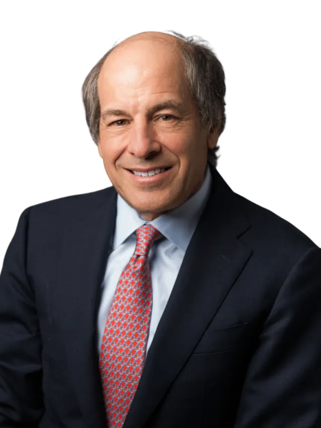 a man in a suit smiling