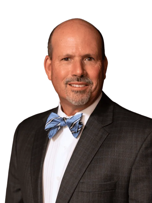 Greenberg Mark wearing a suit and bow tie