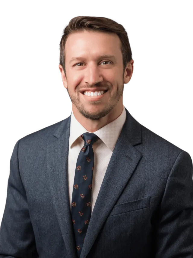 a man in a suit smiling