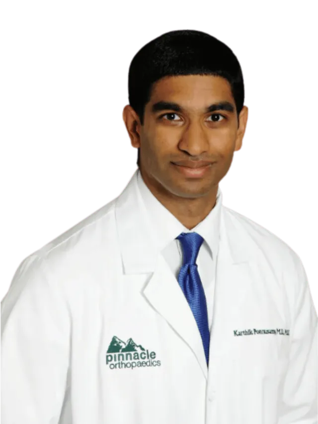 a man in a white shirt and blue tie