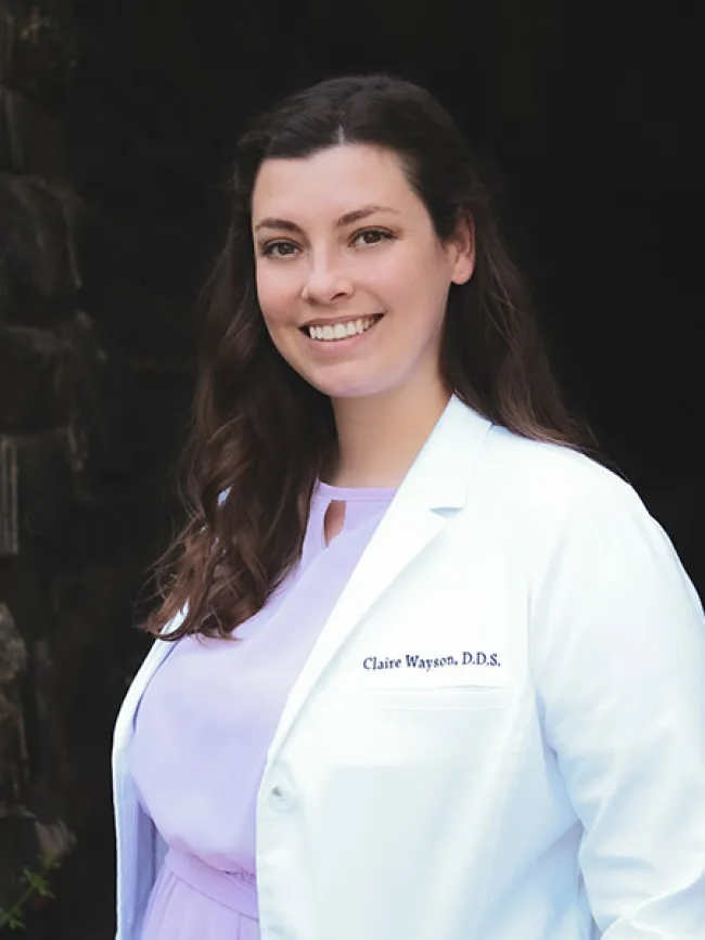 a person wearing a white coat