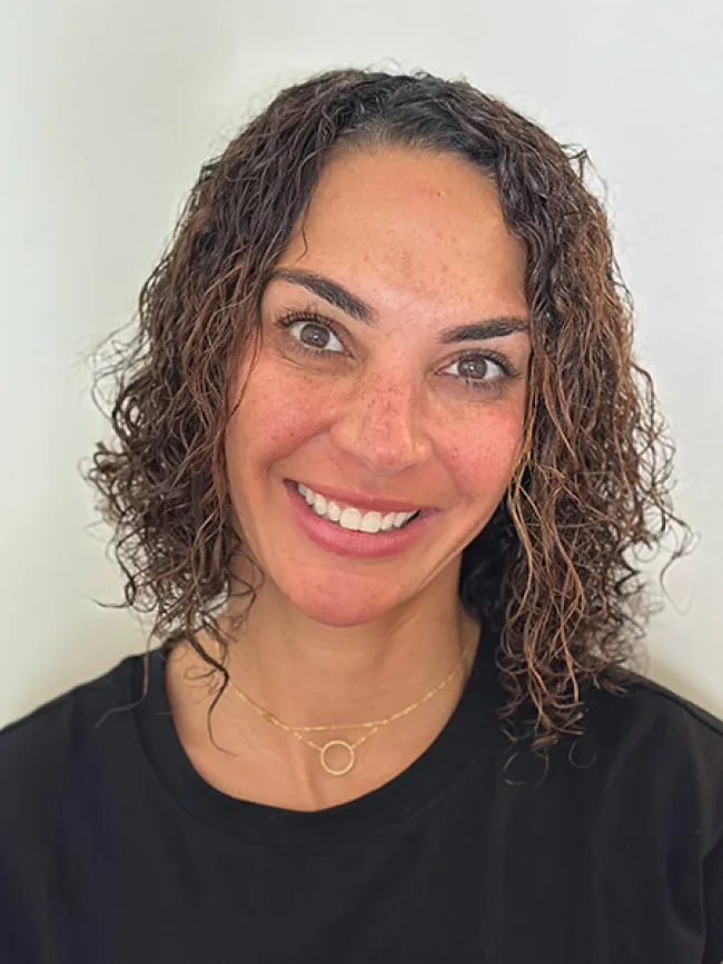 a close-up of a woman smiling