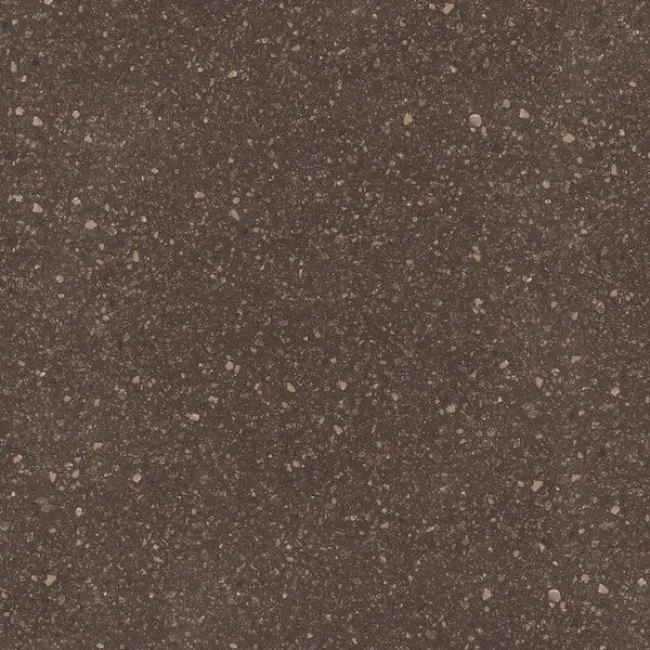 a black surface with small white specks on it