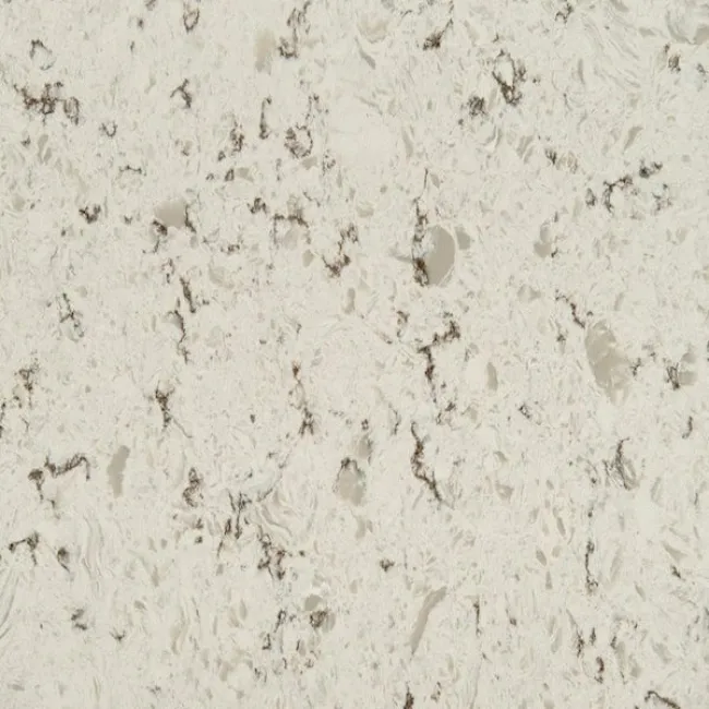 a white surface with black specks