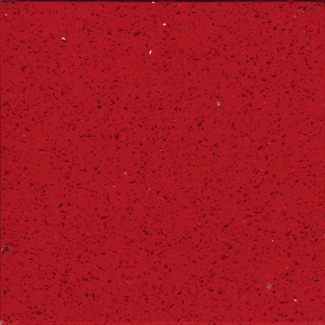 a red surface with small specks