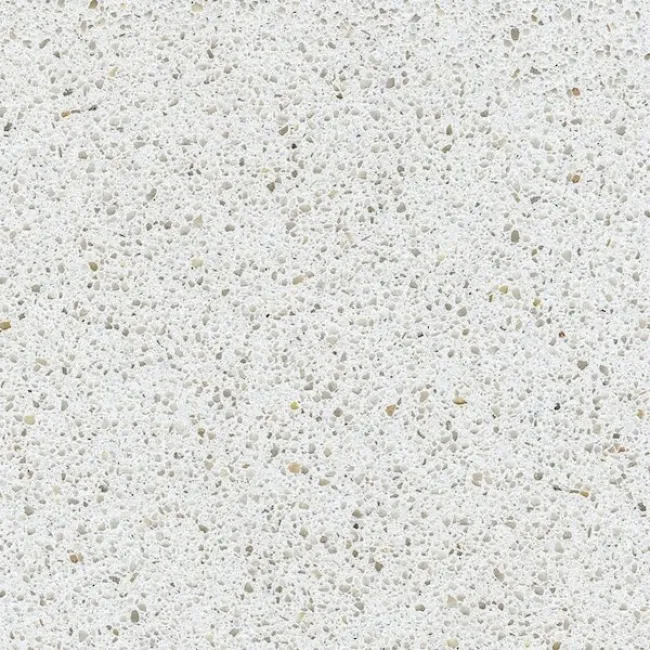 a white surface with small specks