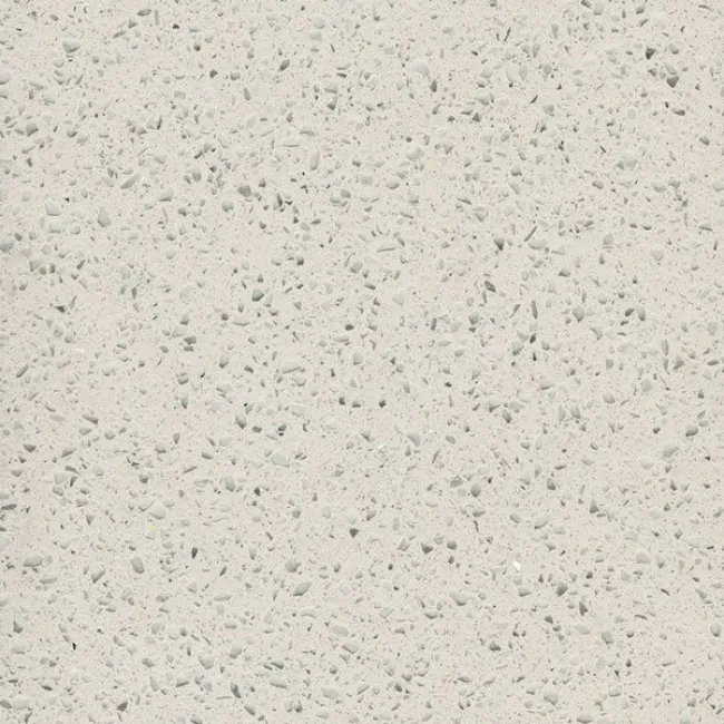 a white surface with small specks