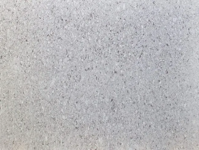 a close up of a grey surface