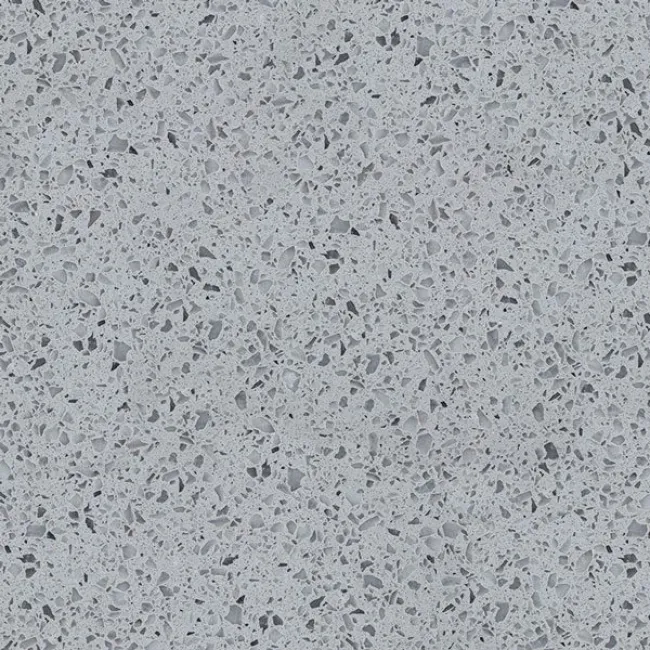 a white surface with small specks