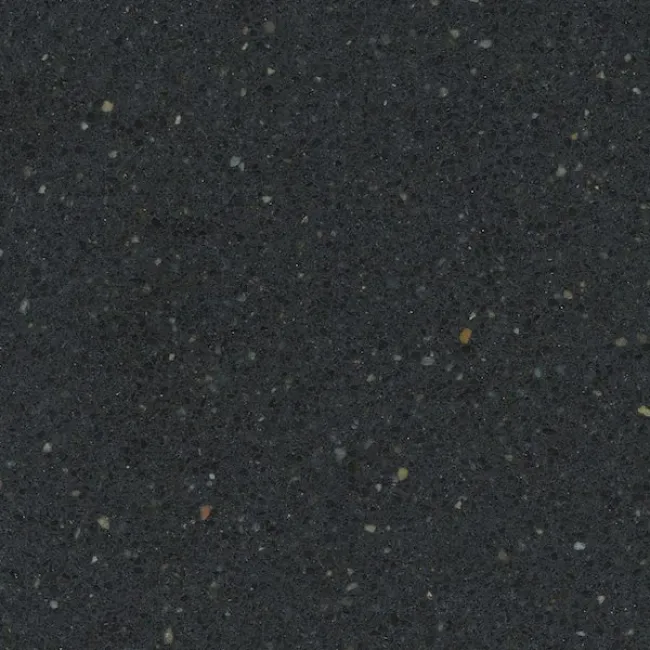 a black surface with small leaves