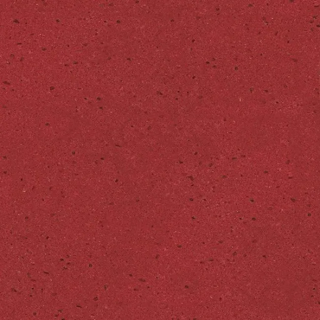 a red surface with a dark background