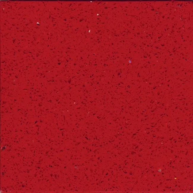 a red surface with small specks