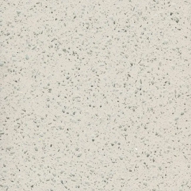 a white surface with small specks