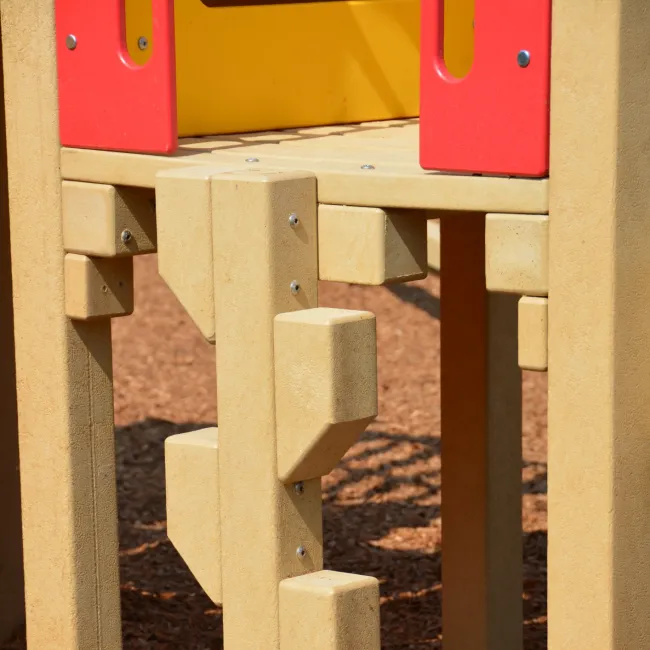 a wooden box with a hole in it