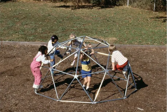 a group of people playing ping pong