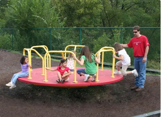 a group of people playing on a playground