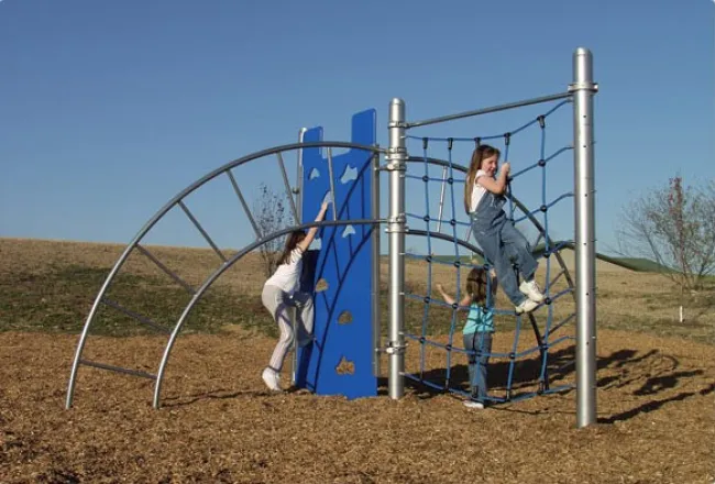 a person and a child playing on a playground