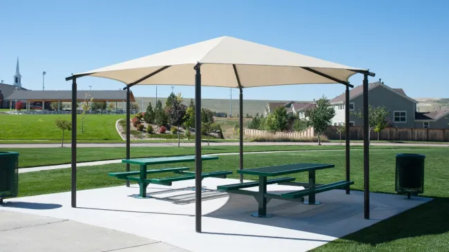 a picnic table and umbrella