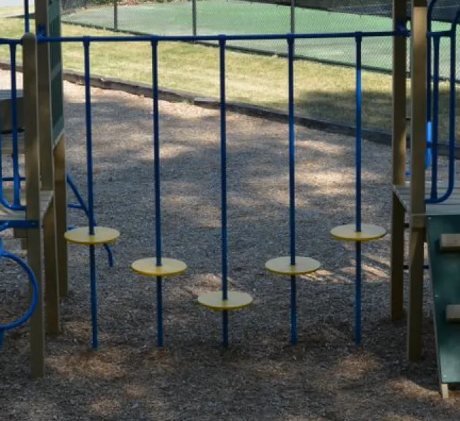 a group of stools in a playground