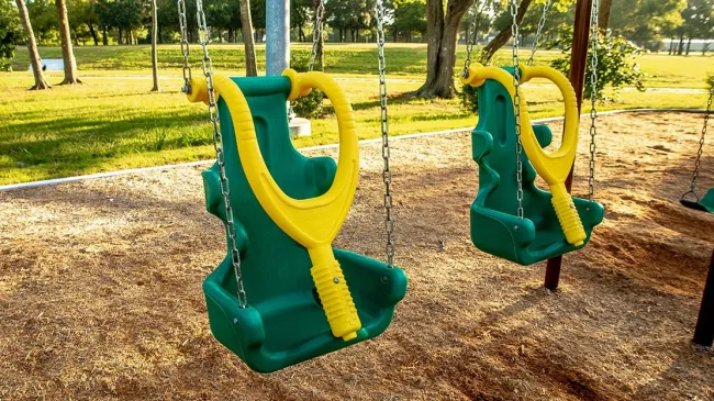 a swing set in a park