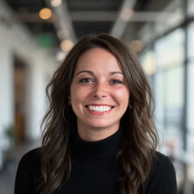 a woman smiling at the camera