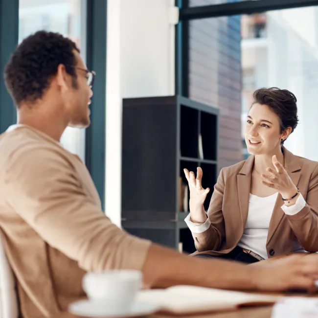 a man and a woman sitting at a table