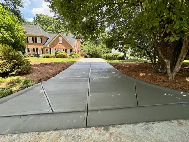 a driveway leading to a house