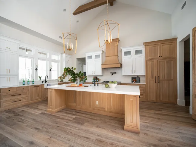 a kitchen with wooden cabinets