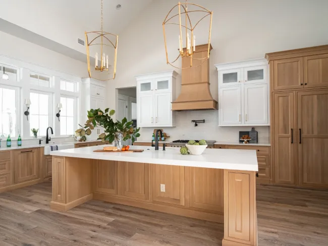 a kitchen with wooden cabinets