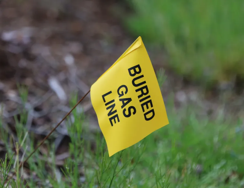 a yellow gas line flag