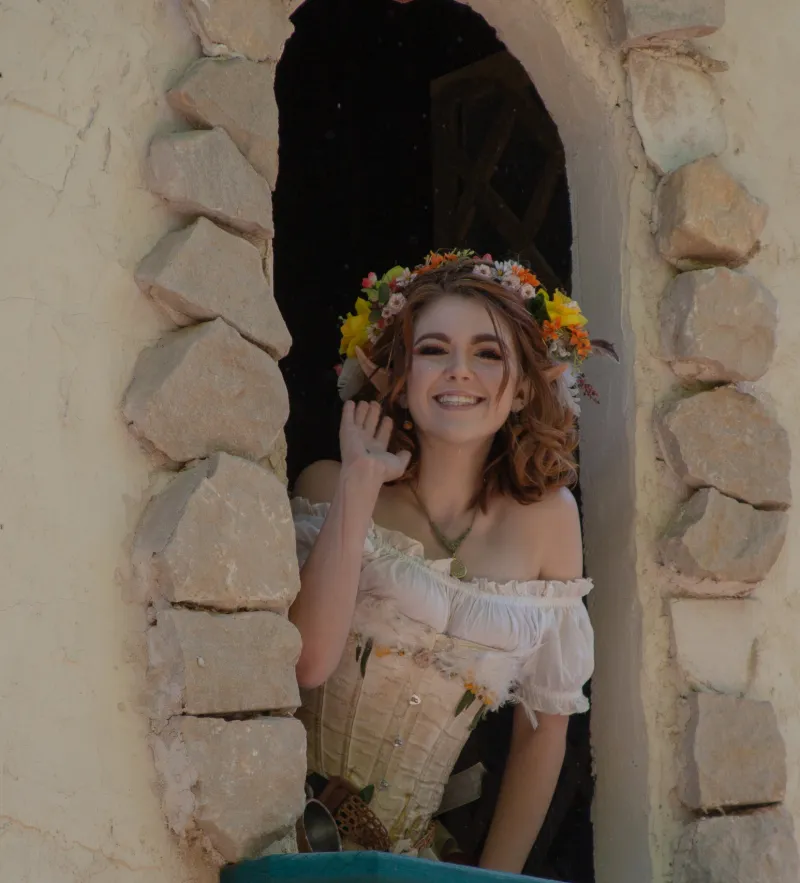 A crew member in a village tower at the Georgia Renaissance Festival