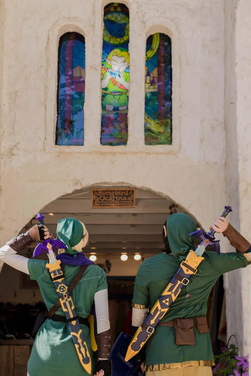 Two guests in matching cosplay at the Georgia Renaissance Festival