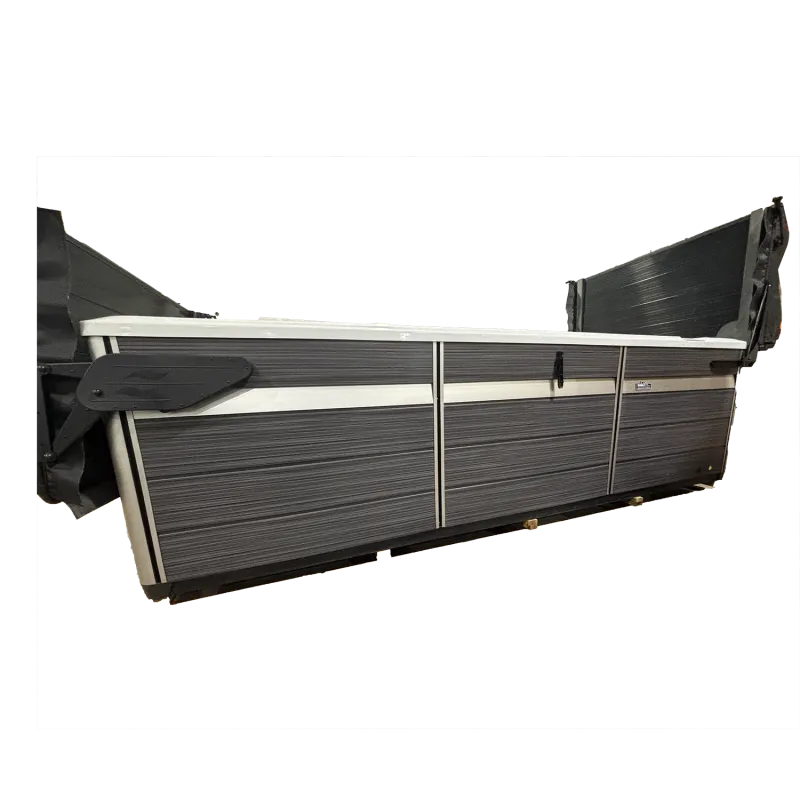 Gray and white rectangular structure with black hinges and panels on the sides isolated on black.