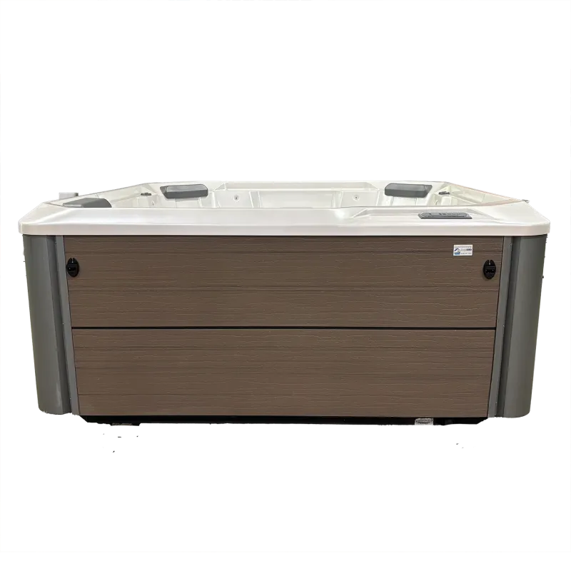 Modern rectangular hot tub with white interior and wood-paneled exterior designed for outdoor relaxation.
