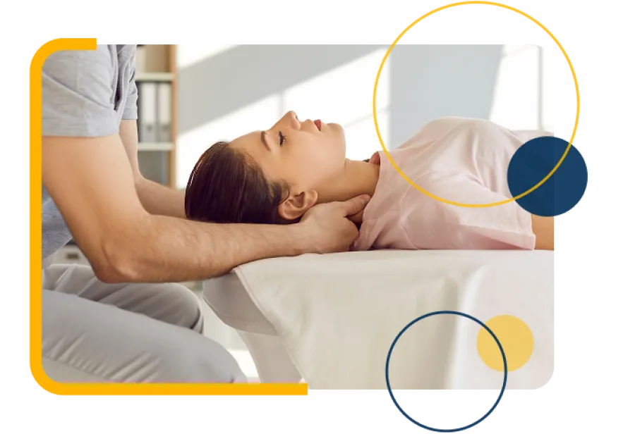 Therapist giving woman a gentle neck massage in a bright, calm therapy room for relaxation and pain relief.