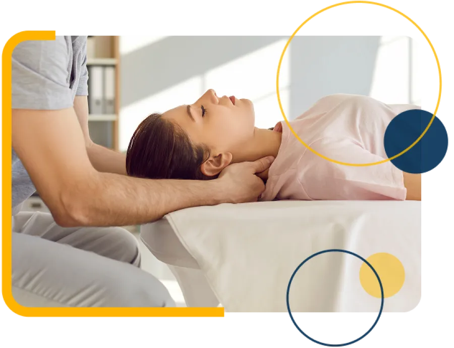 Therapist performing gentle neck massage on relaxed woman lying on treatment table in bright room.