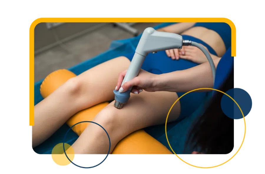 Therapist performing ultrasound therapy on a patient's knee for pain relief and rehabilitation.
