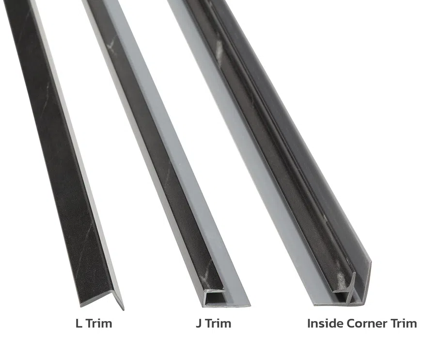 Black marble L Trim, J Trim, and Inside Corner Trim pieces displayed on white background.