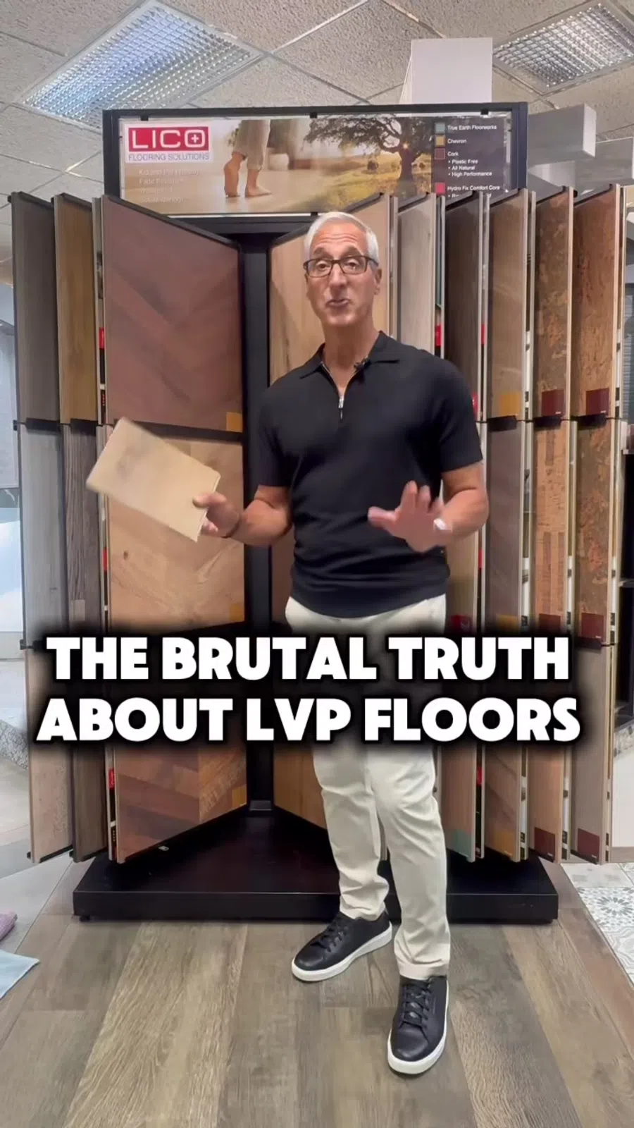 Man in a flooring store holding a sample with LICO Flooring Solutions displays behind him and text about LVP floors.