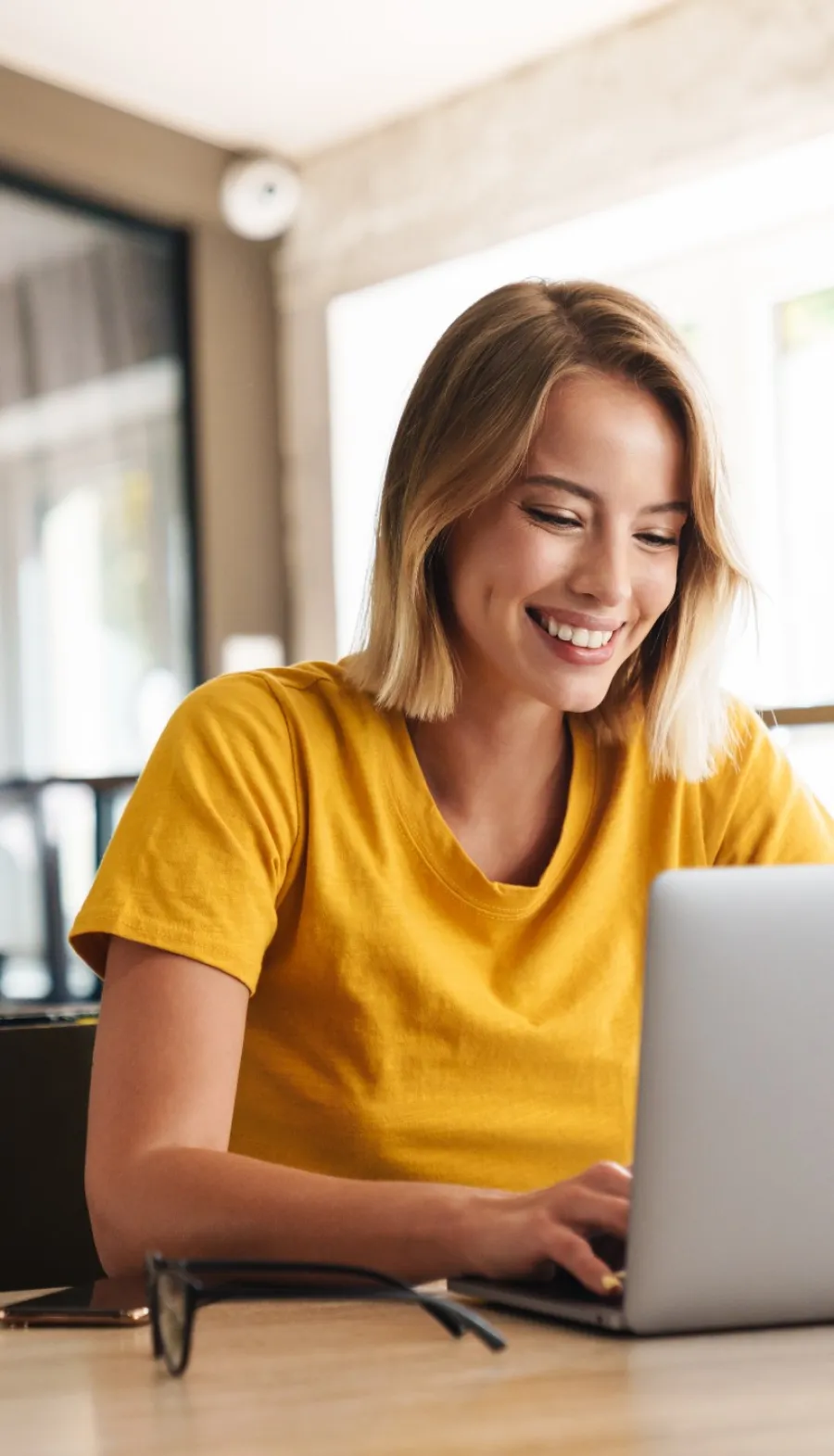 a woman working on her laptop